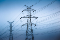 High voltage towers with sky background. blue toned images.