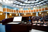 Speaker's table in conference room.